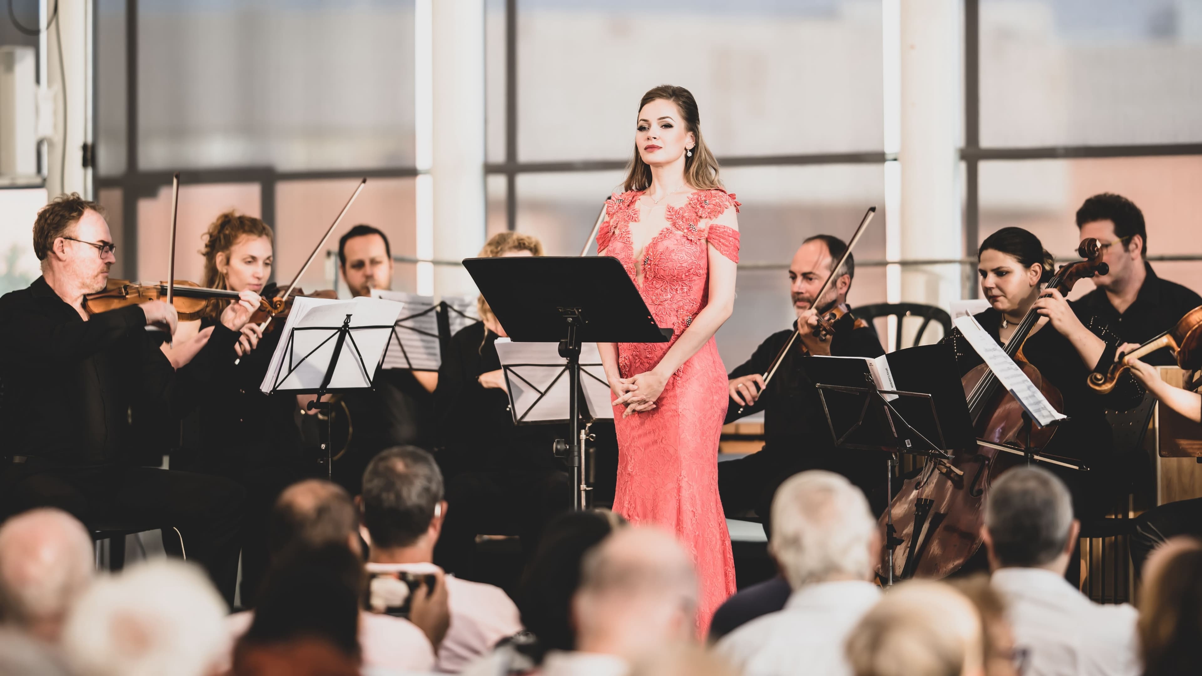 Veronika Brook with a symphony orchestra